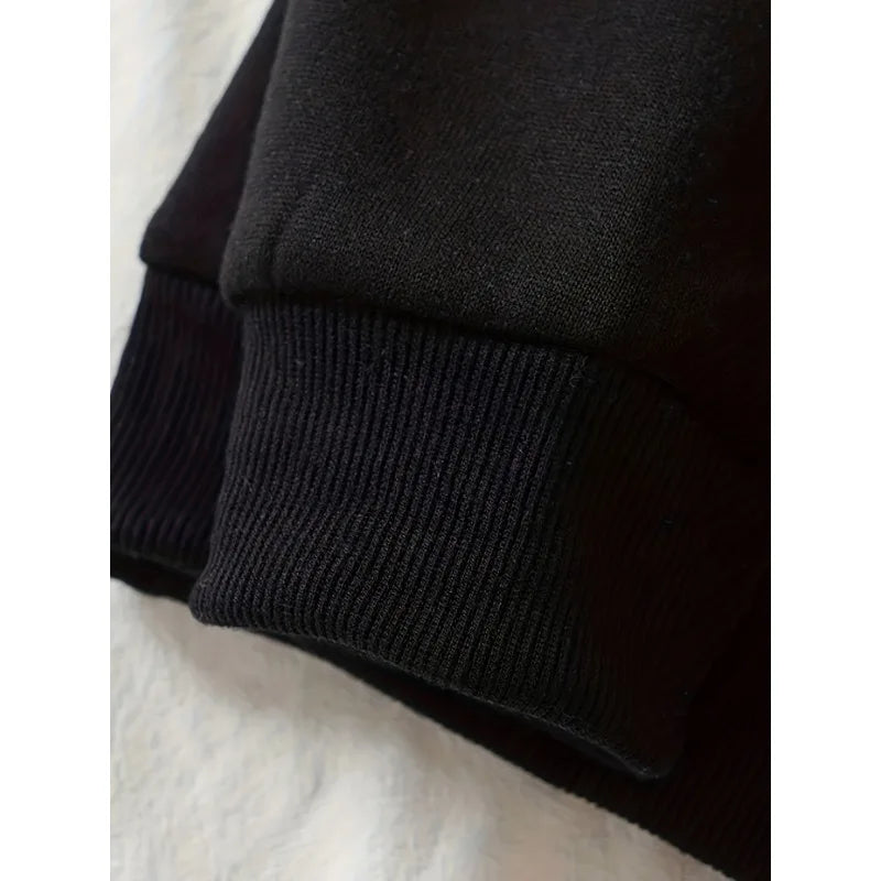 Men's black oversized hoodie with Gothic wing and spine pattern printed loose fit casual pullover suitable for streetwear Y2K